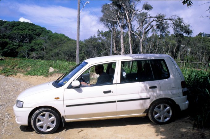 Our rental car, still white at that time on a small island near Brisbane, Australia. Note that the wheel is