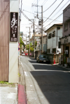 Fujisawa, with more wires than trees, a quite small street close to the station.