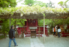 A small shrine surrounded by a lake, in a big temple place, near Kamakura station, I don't remember the name...