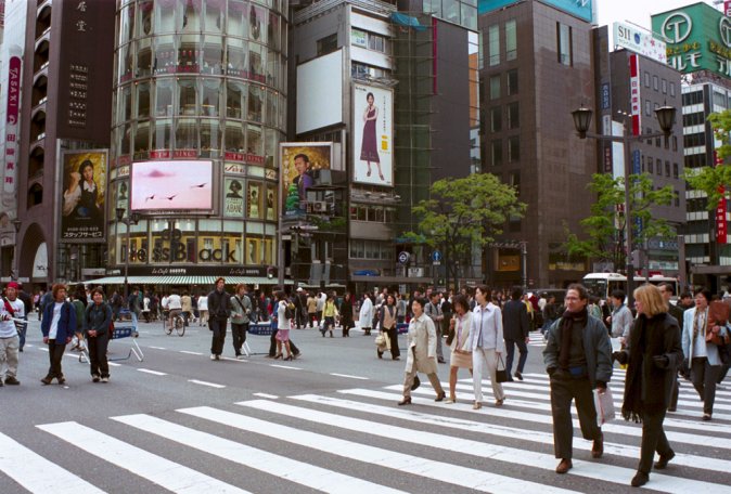 A crossing in Ginza (Tokyo), on a sunday afternoon, while the car are not allowed.