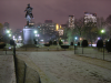 Boston Common, with a statue, guarding snow.