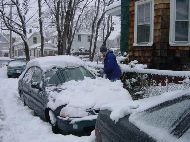 Hugo cleaning the car, for an expedition to the ranch