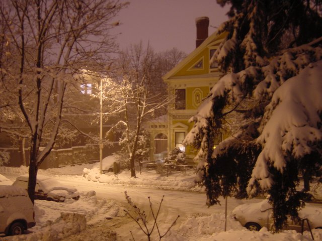 A view from the ranch at night, with lots of snow.