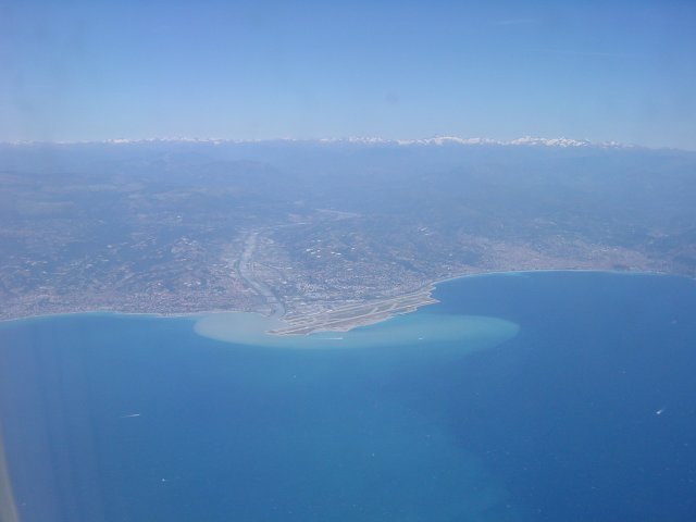 A view over Nice, St Laurent du Var after rain in the mountains. Mountains still have some snow.